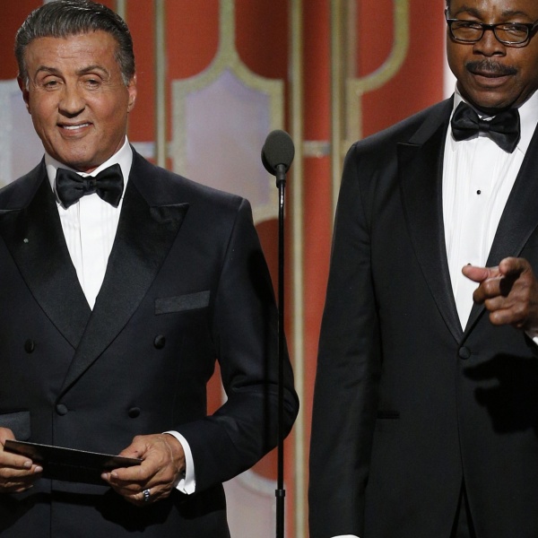 BEVERLY HILLS, CA - JANUARY 08: In this handout photo provided by NBCUniversal, Sylvester Stallone (L) and Carl Weathers, who co-starred in the 1977 Golden Globe Award-winning film "Rocky", present the Golden Globe for Best Motion Picture - Drama  onstage during the 74th Annual Golden Globe Awards at The Beverly Hilton Hotel on January 8, 2017 in Beverly Hills, California. (Photo by Paul Drinkwater/NBCUniversal via Getty Images)